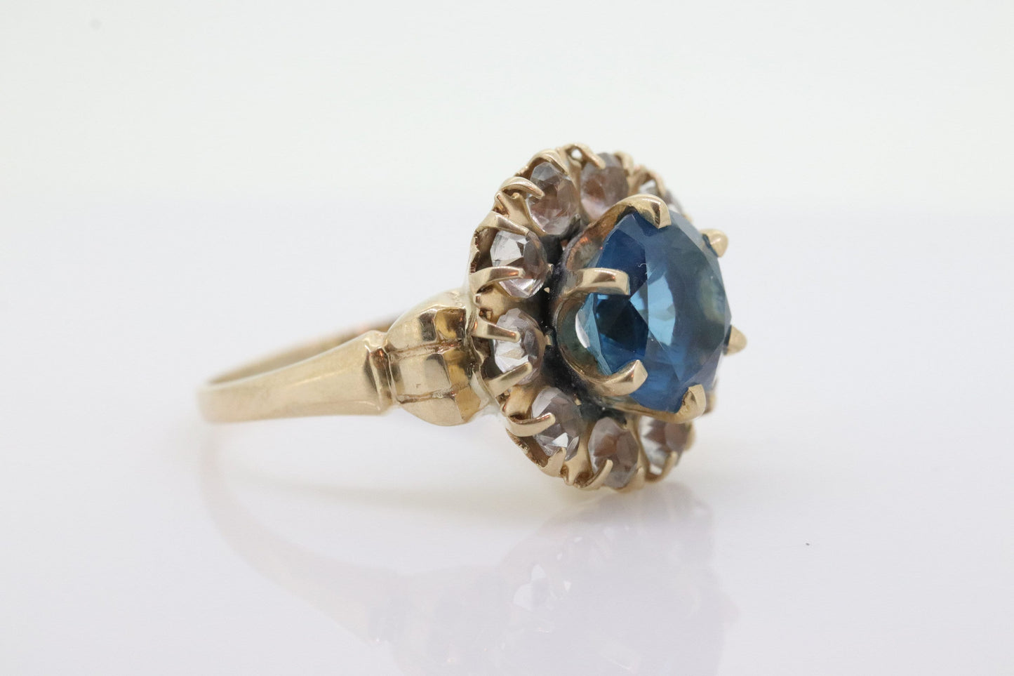 10k Blue Topaz and White Topaz Halo ring. 10k Aquamarine Halo solitaire. st(80)