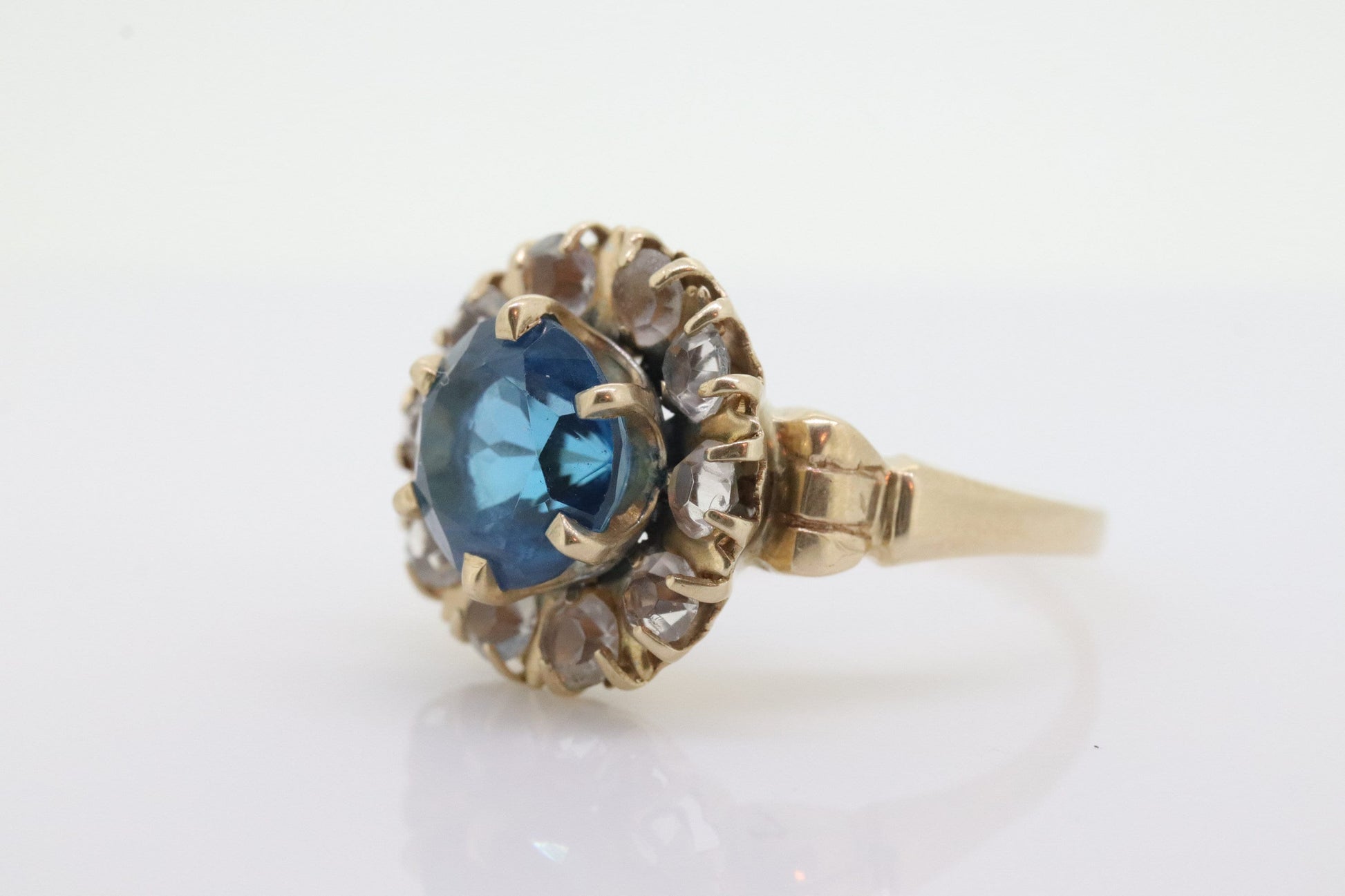 10k Blue Topaz and White Topaz Halo ring. 10k Aquamarine Halo solitaire. st(80)