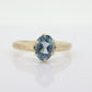 10k Topaz Solitaire Ring. 10k yellow gold HANDWROUGHT Blue Oval Topaz solitaire ring. st(42)