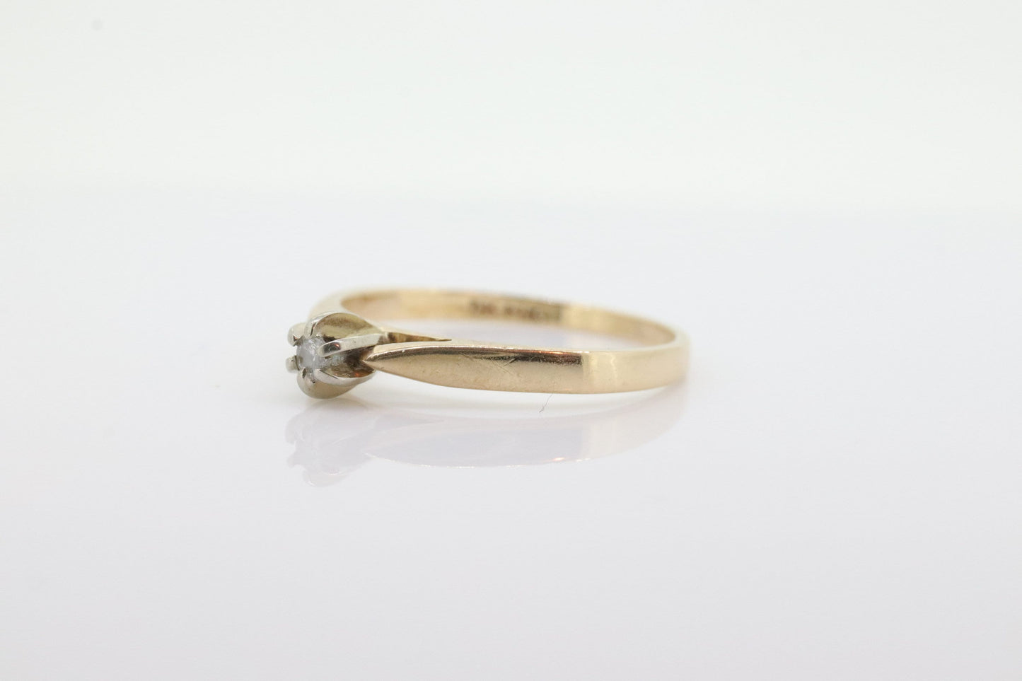 14k Diamond Solitaire. 14k Yellow gold prong belcher set diamond ring. st(55)