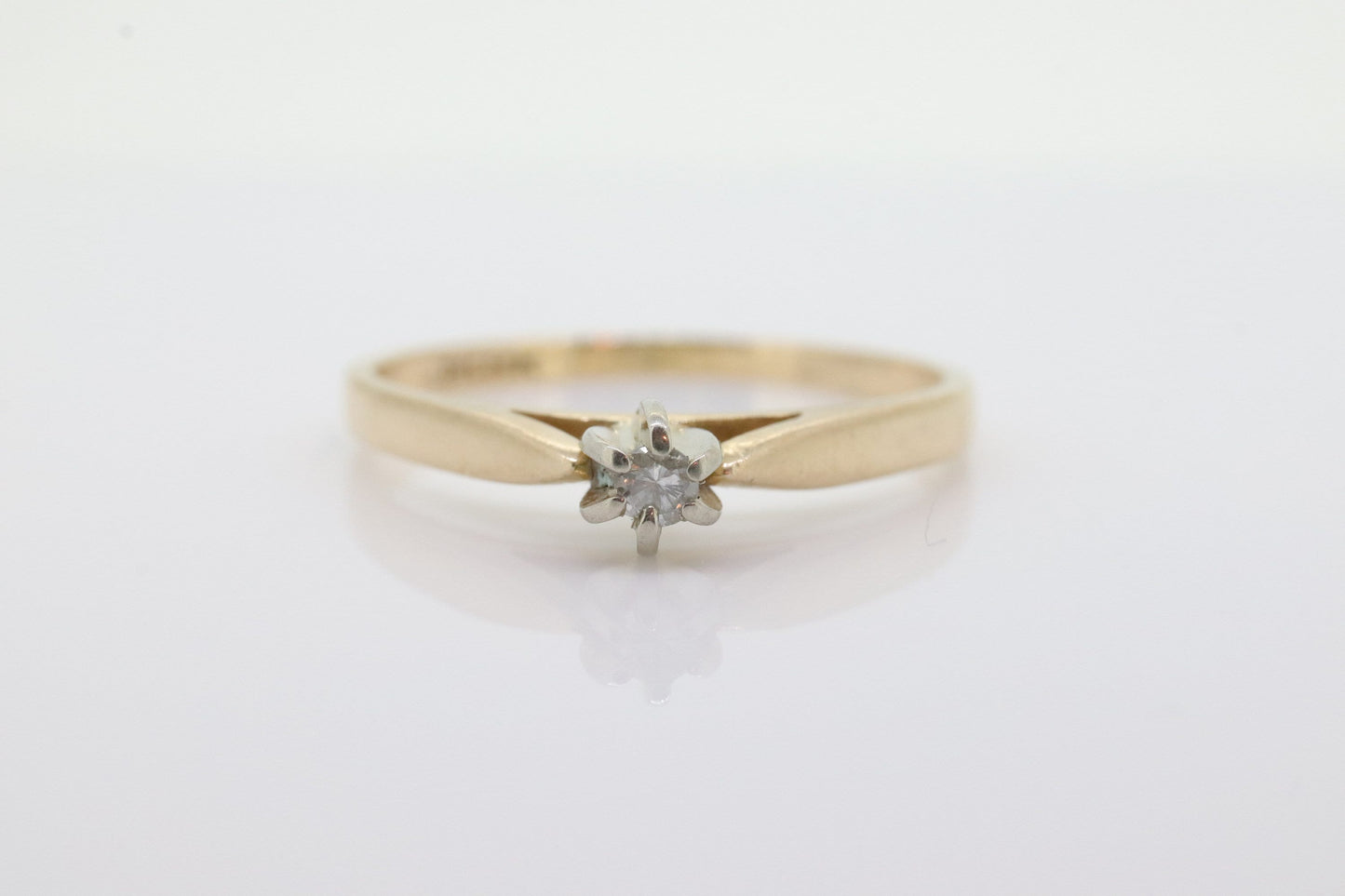 14k Diamond Solitaire. 14k Yellow gold prong belcher set diamond ring. st(55)