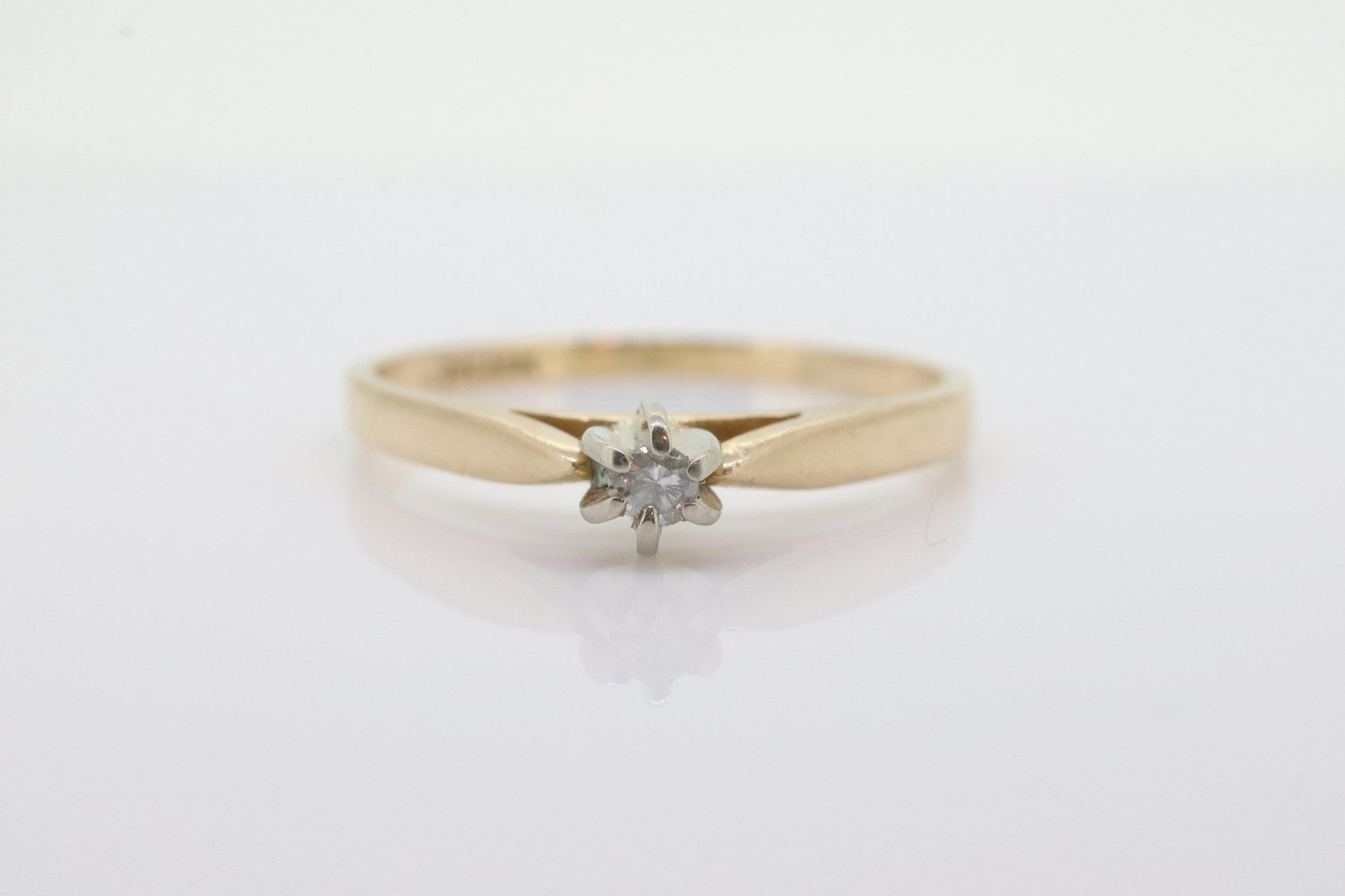 14k Diamond Solitaire. 14k Yellow gold prong belcher set diamond ring. st(55)