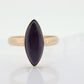 10k SUGILITE Purple bezel ring. Antique 10k Marquise Purple Sugilite bezel set in a cup shank. st(80)