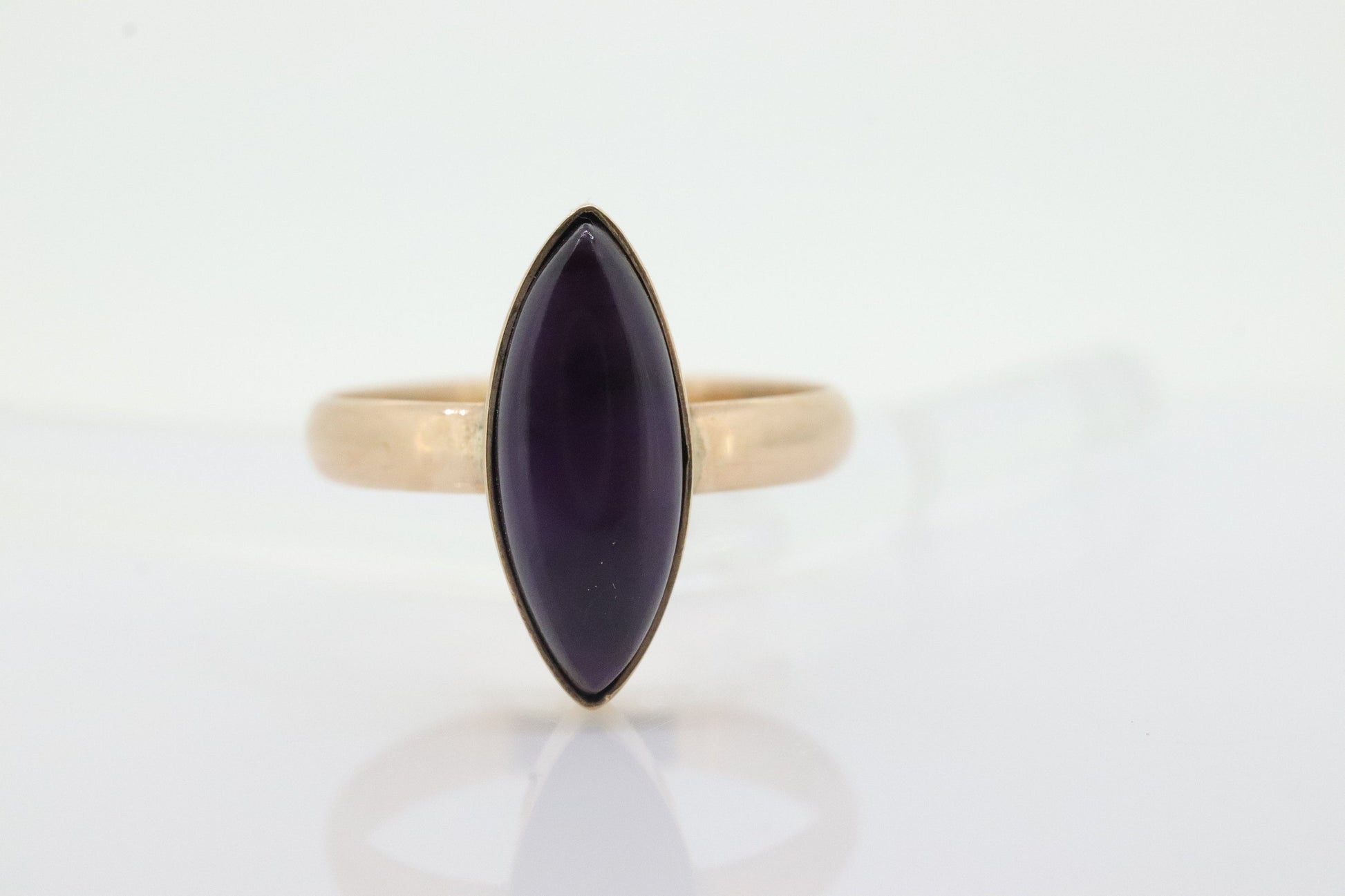 10k SUGILITE Purple bezel ring. Antique 10k Marquise Purple Sugilite bezel set in a cup shank. st(80)