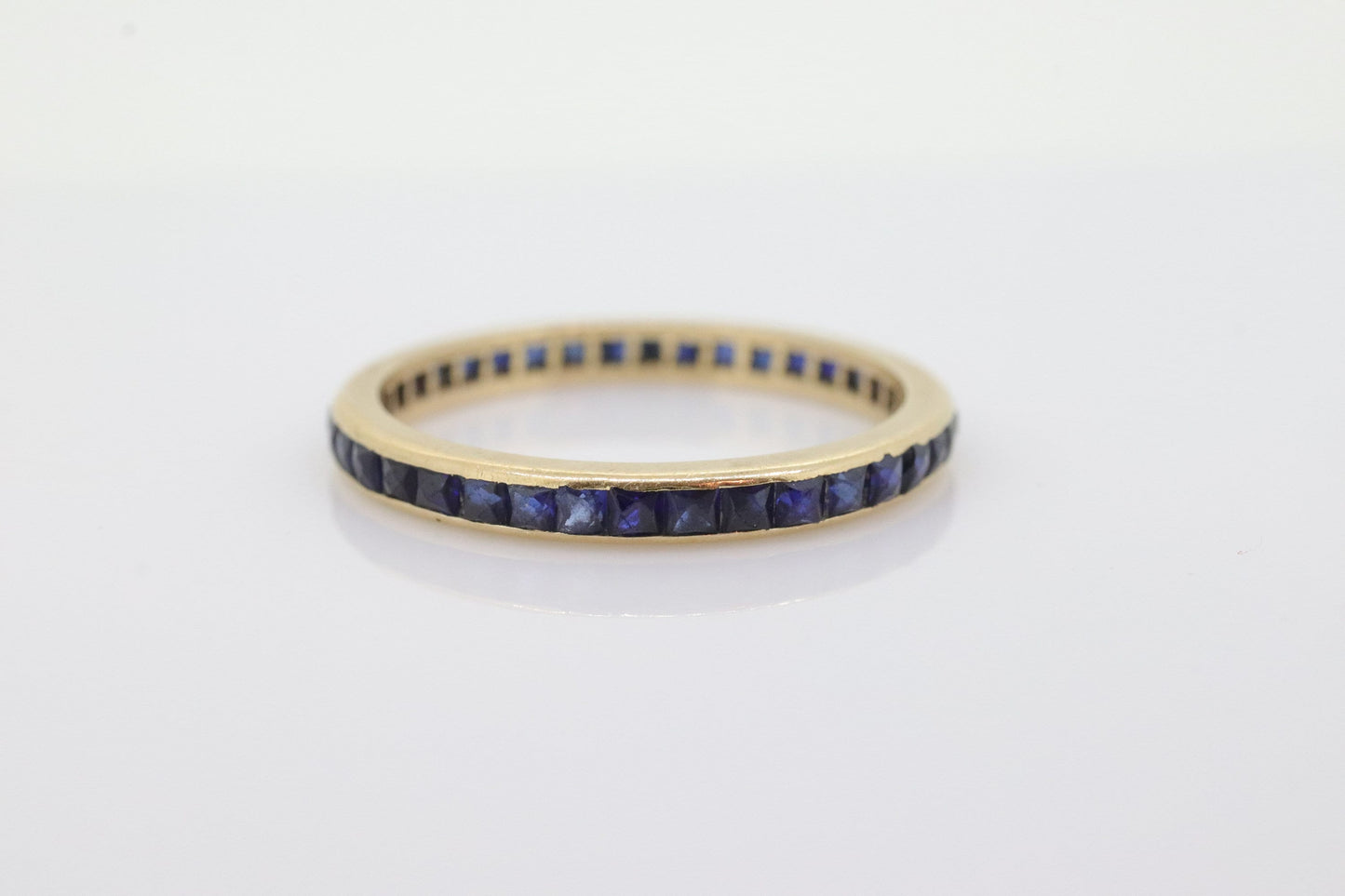 14k Gold BLUE Sapphire Full Eternity Thin Band. Thin Channel Set Princess Sapphire calibre cut Full Eternity band. st(110)