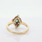 14k round Emerald and diamond ring. 14k Yellow gold marquise shape with diamond accents. st(55)