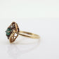 14k round Emerald and diamond ring. 14k Yellow gold marquise shape with diamond accents. st(55)
