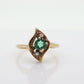 14k round Emerald and diamond ring. 14k Yellow gold marquise shape with diamond accents. st(55)