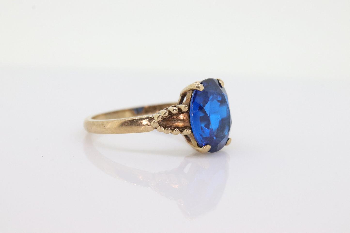 10k Oval Blue Spinel ring. 10k Yellow Gold Blue Spinel Solitaire Ring st98