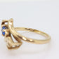 10k LOVE ring. 10k Yellow Gold with round Blue Spinel Solitaire Ring