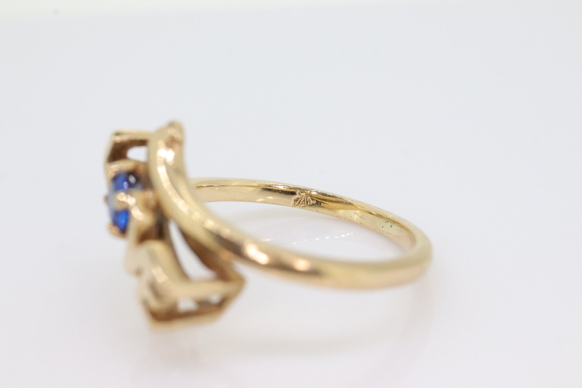 10k LOVE ring. 10k Yellow Gold with round Blue Spinel Solitaire Ring