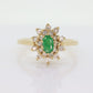 14k Emerald and Diamond Halo yellow gold ring. Emerald and Diamond Cluster ring. (15)(00.130)