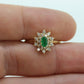 14k Emerald and Diamond Halo yellow gold ring. Emerald and Diamond Cluster ring. (15)(00.130)