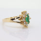14k Marquise Emerald and Diamond Halo yellow gold ring. 0.36ctw in diamonds