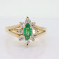 14k Marquise Emerald and Diamond Halo yellow gold ring. 0.36ctw in diamonds