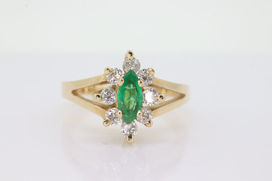 14k Marquise Emerald and Diamond Halo yellow gold ring. 0.36ctw in diamonds