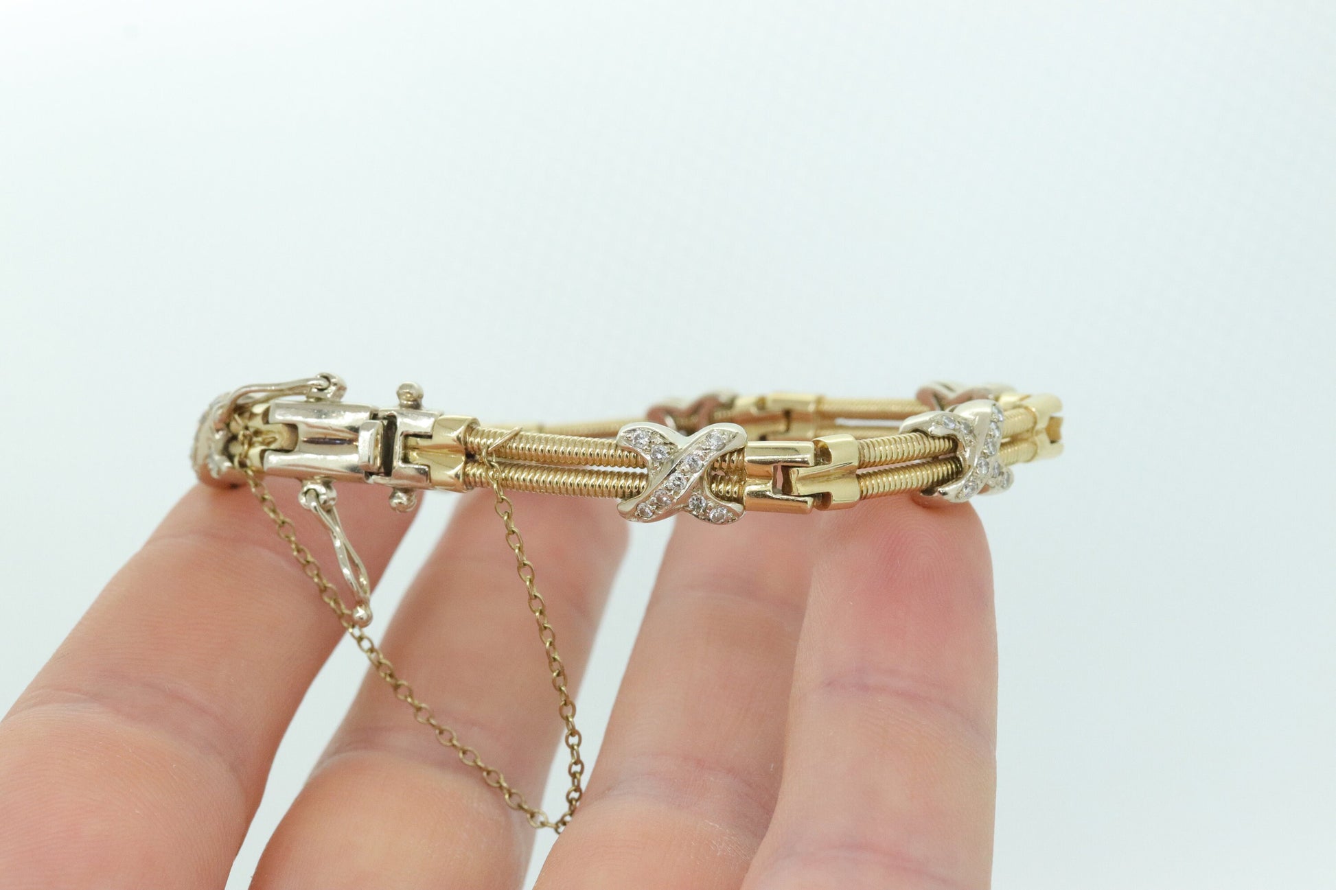 Diamond X slide Bracelet. 14k Yellow White Gold XO Diamond Slide cord Bracelet. 27.4grams Two strand station bracelet. st(302/50)