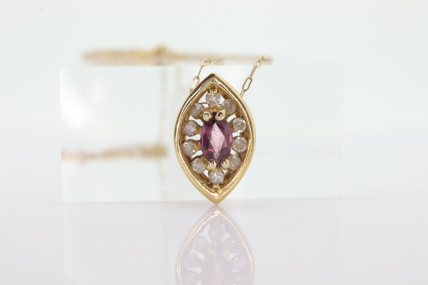 Ruby and diamond halo pendant. 14k precious marquise ruby pendant necklace. st(80/50)