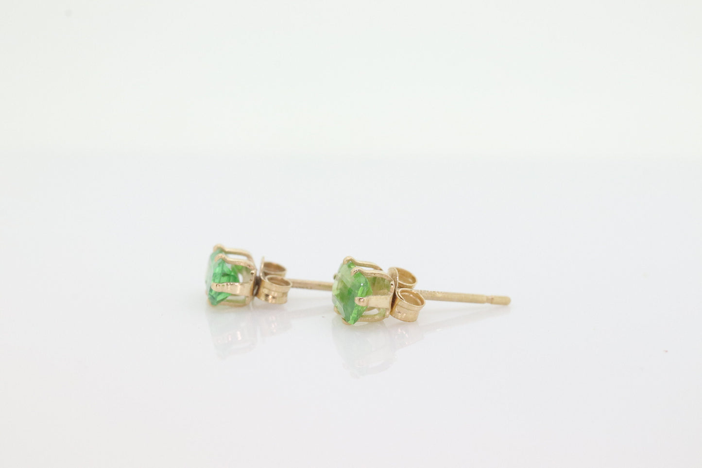 14k Green Peridot Emerald cut stud earrings. st (43)