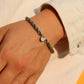 Tiffany & Co. Bracelet. Rope Love Knot Sterling Silver and 18k Yellow Gold Intertwined Bracelet. st(155)