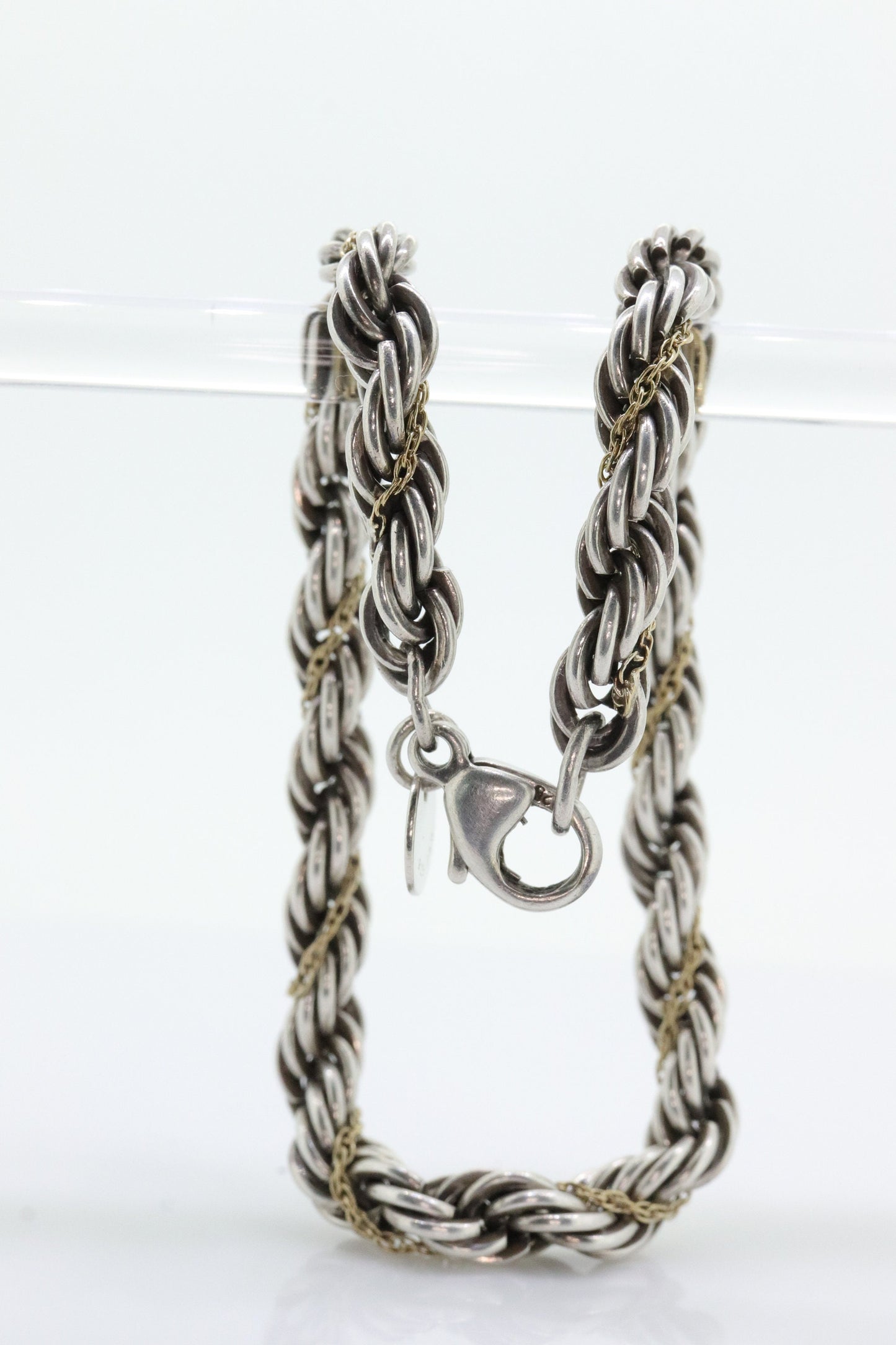 Tiffany & Co. Bracelet. Rope Love Knot Sterling Silver and 18k Yellow Gold Intertwined Bracelet. st(155)