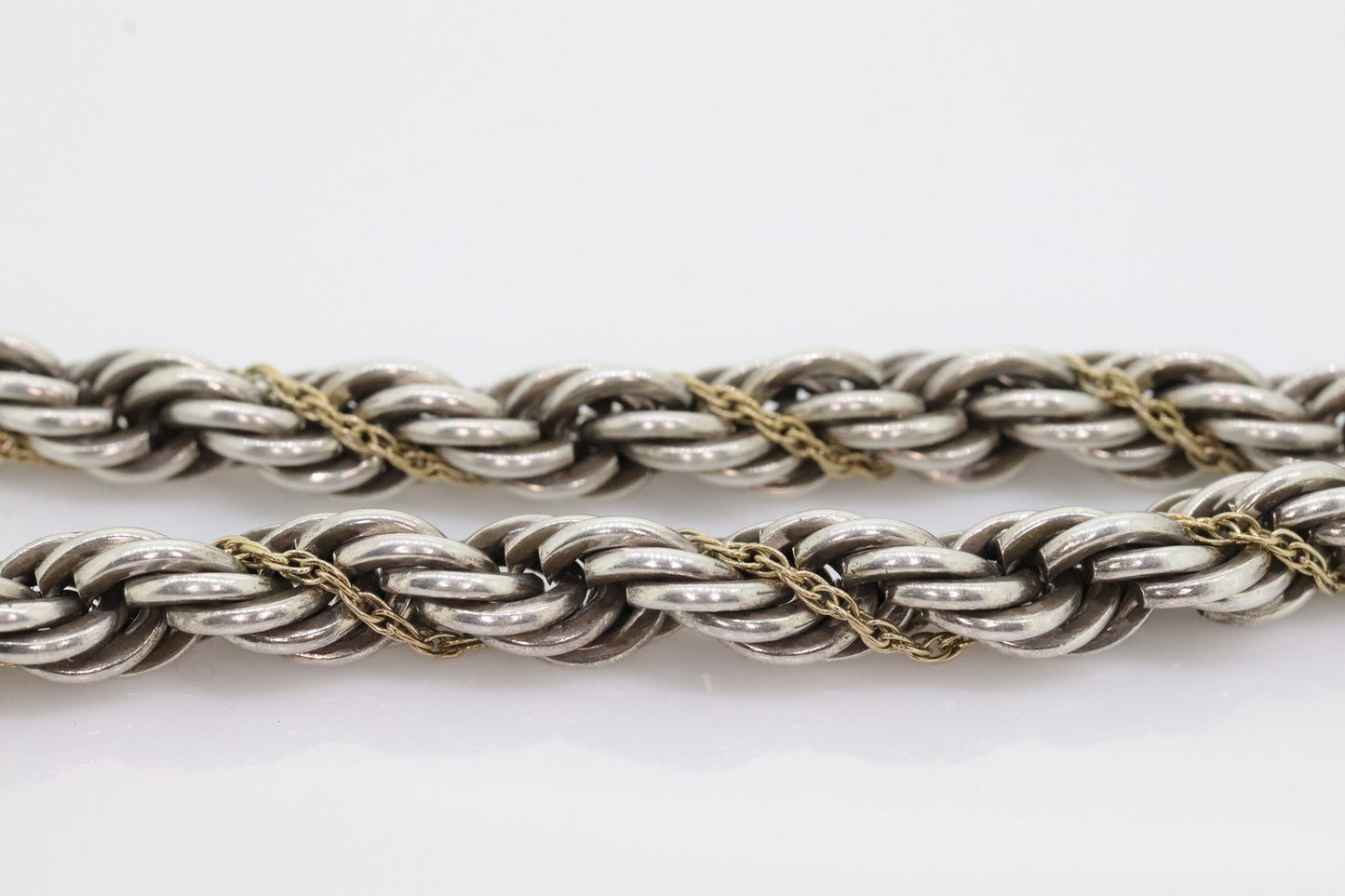 Tiffany & Co. Bracelet. Rope Love Knot Sterling Silver and 18k Yellow Gold Intertwined Bracelet. st(155)