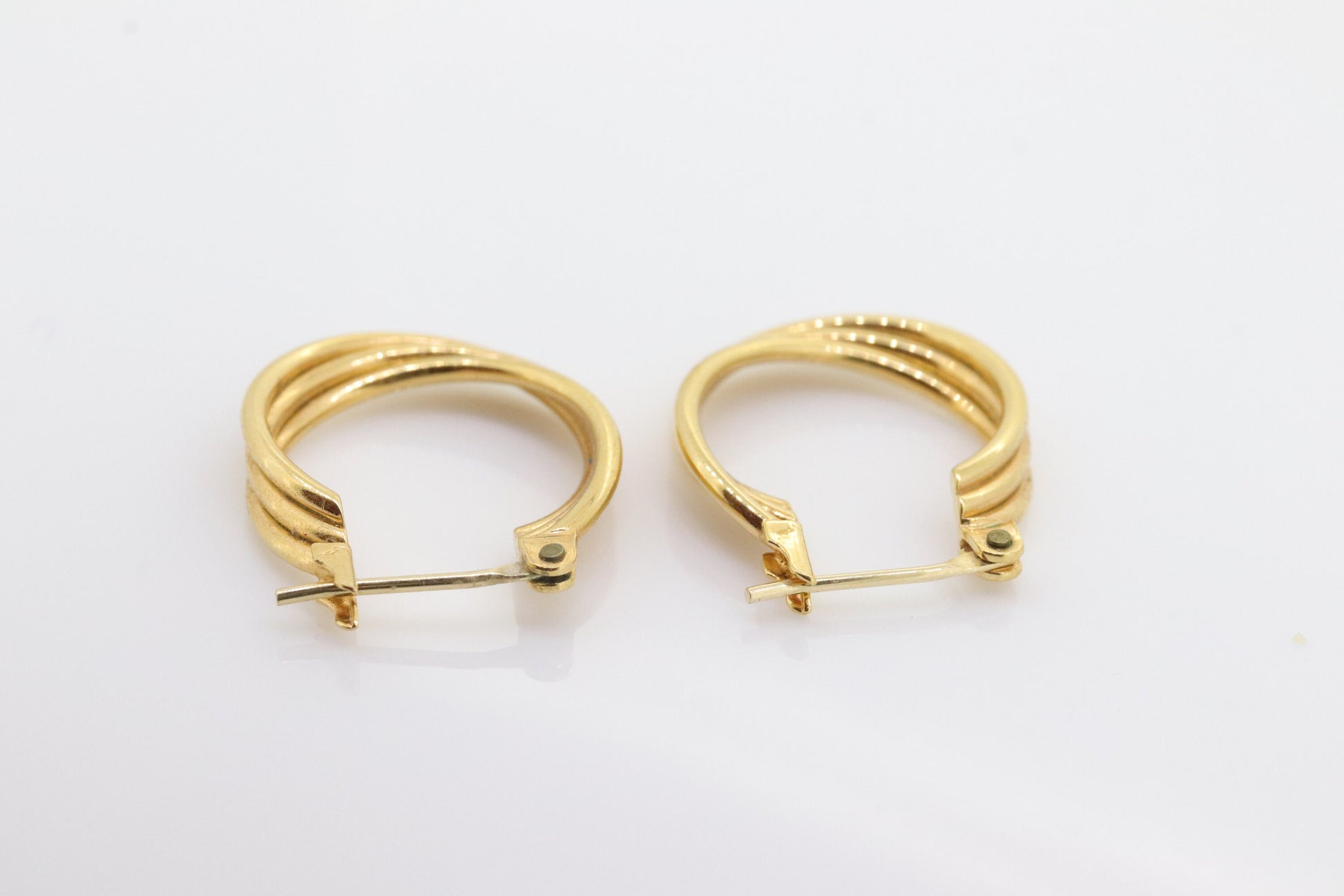 10k Gold HOOP Earrings. 10k Yellow Gold Triple HOOP earrings Twisted design. . st63