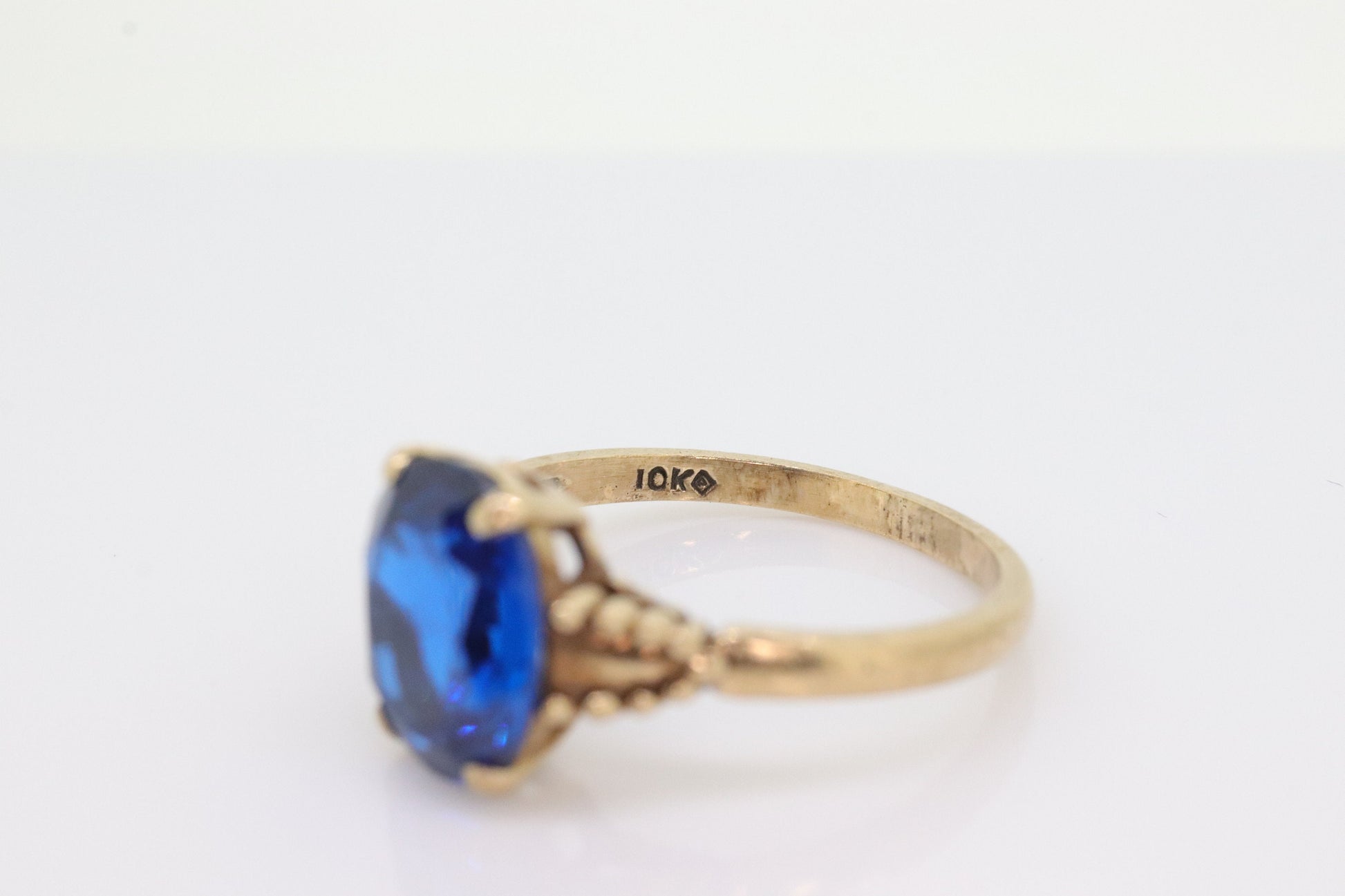 10k Oval Blue Spinel ring. 10k Yellow Gold Blue Spinel Solitaire Ring st98