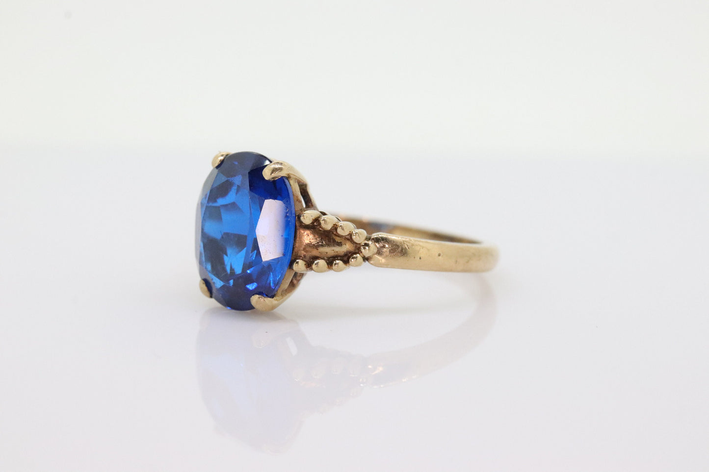 10k Oval Blue Spinel ring. 10k Yellow Gold Blue Spinel Solitaire Ring st98