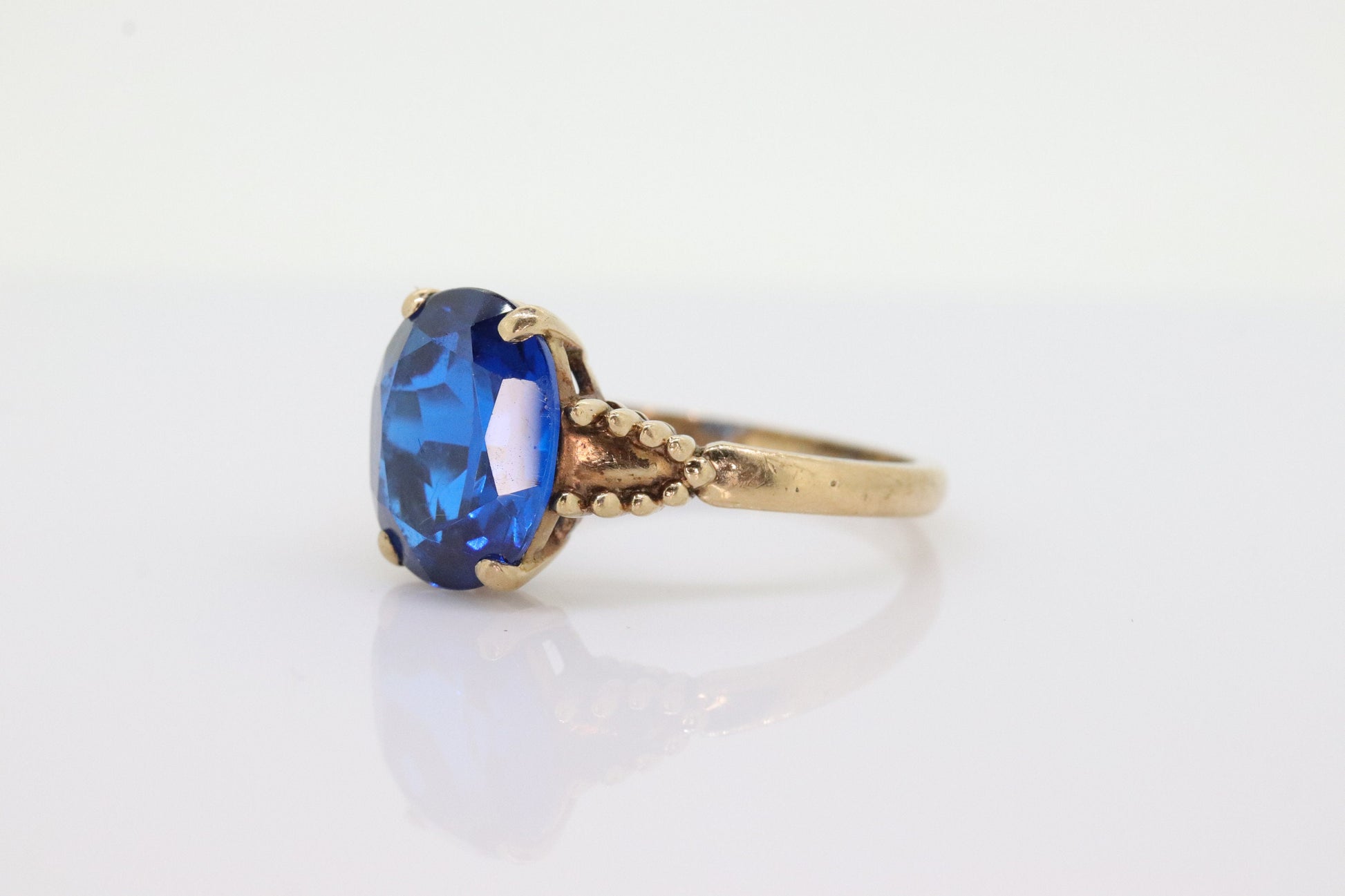 10k Oval Blue Spinel ring. 10k Yellow Gold Blue Spinel Solitaire Ring st98