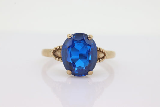 10k Oval Blue Spinel ring. 10k Yellow Gold Blue Spinel Solitaire Ring st98