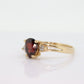 14k Pear Garnet and diamond ring. 14k Pear cut garnet with diamonds solitaire