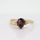 14k Pear Garnet and diamond ring. 14k Pear cut garnet with diamonds solitaire