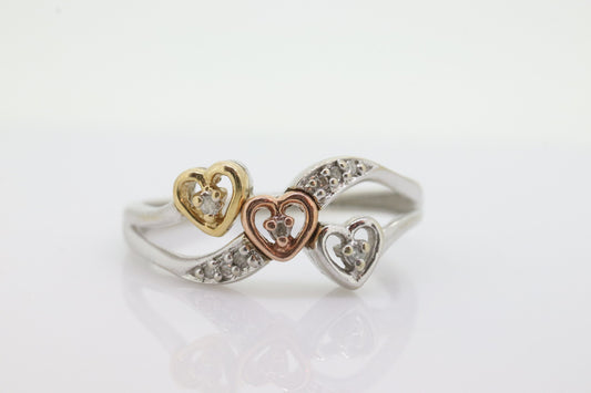 10k Triple Heart Diamond Cluster ring. 10k yellow gold with Rose gold middle heart white gold. st(46)