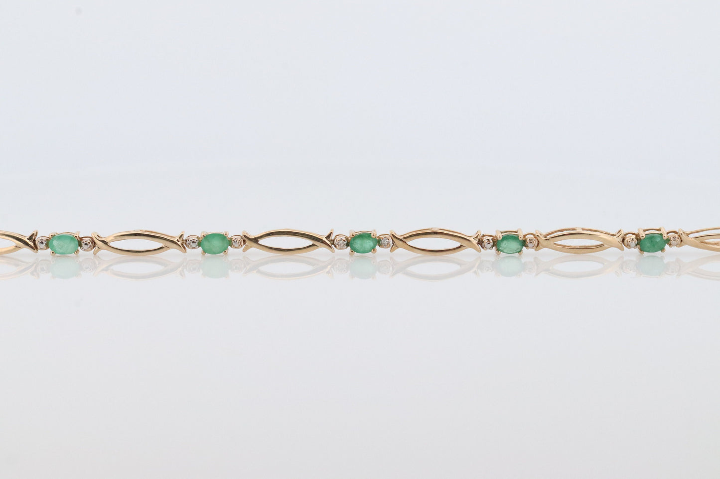 10k Emerald and Diamond Link Bracelet. 10k Bar Link Tennis bracelet. St(147)