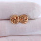 18k LOVE knot stud earring. 18k Yellow Gold Coil KNOT gold studs earrings. Italy Circle Coil studs.