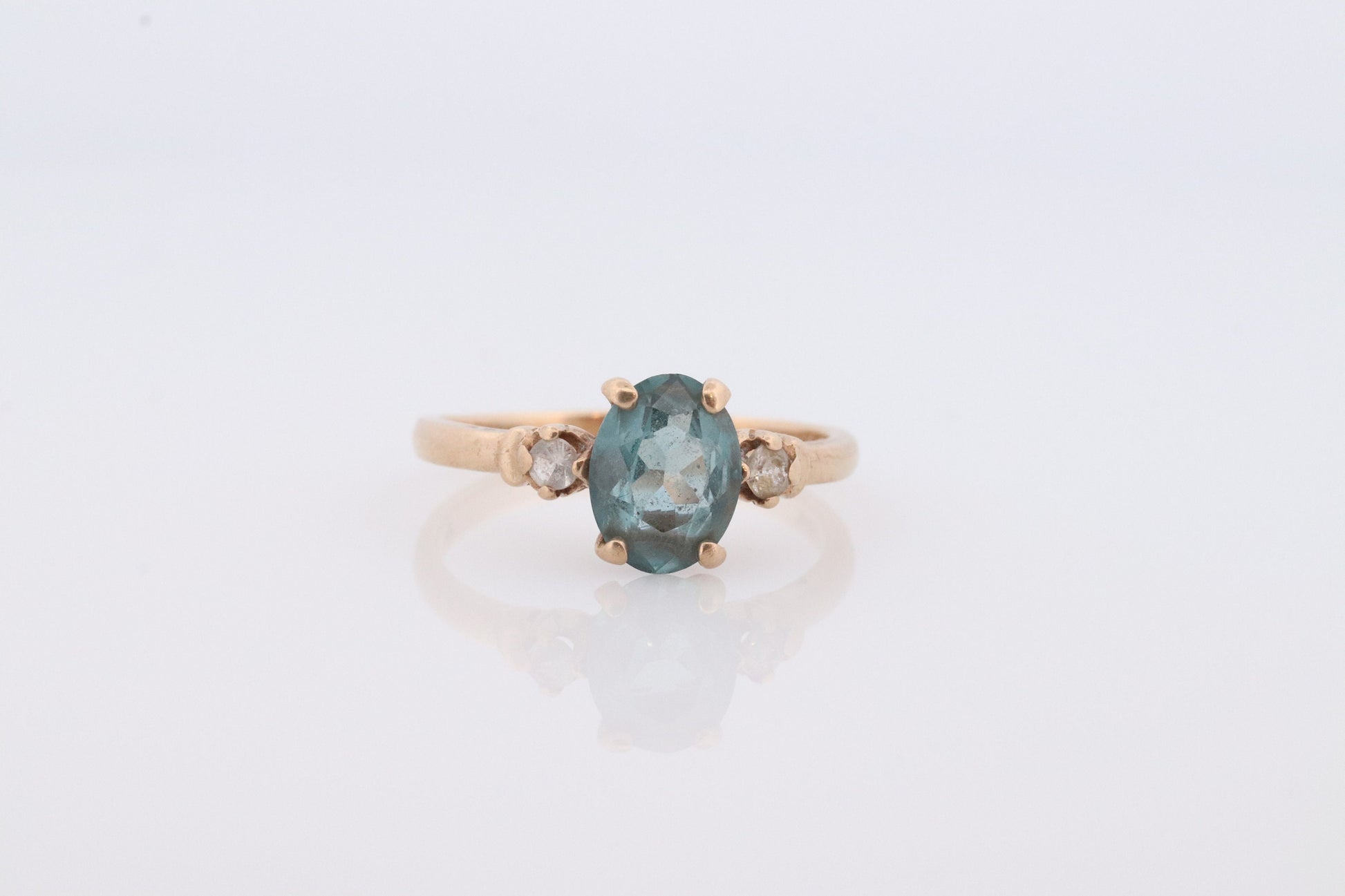 Blue and White Topaz Solitaire Ring. 10k white gold Trio ring. st(42)