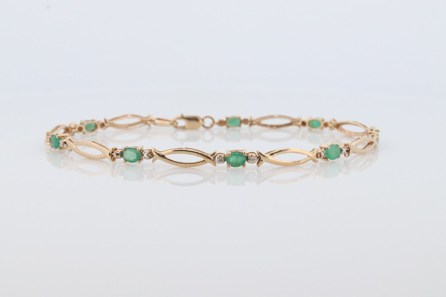 10k Emerald and Diamond Link Bracelet. 10k Bar Link Tennis bracelet. St(147)