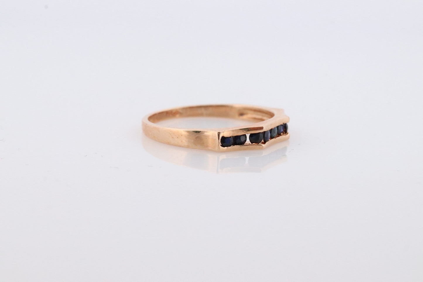 14k Gold BLUE Sapphire Eternity Band. Channel Set Sapphire Fun ring. V channel band.