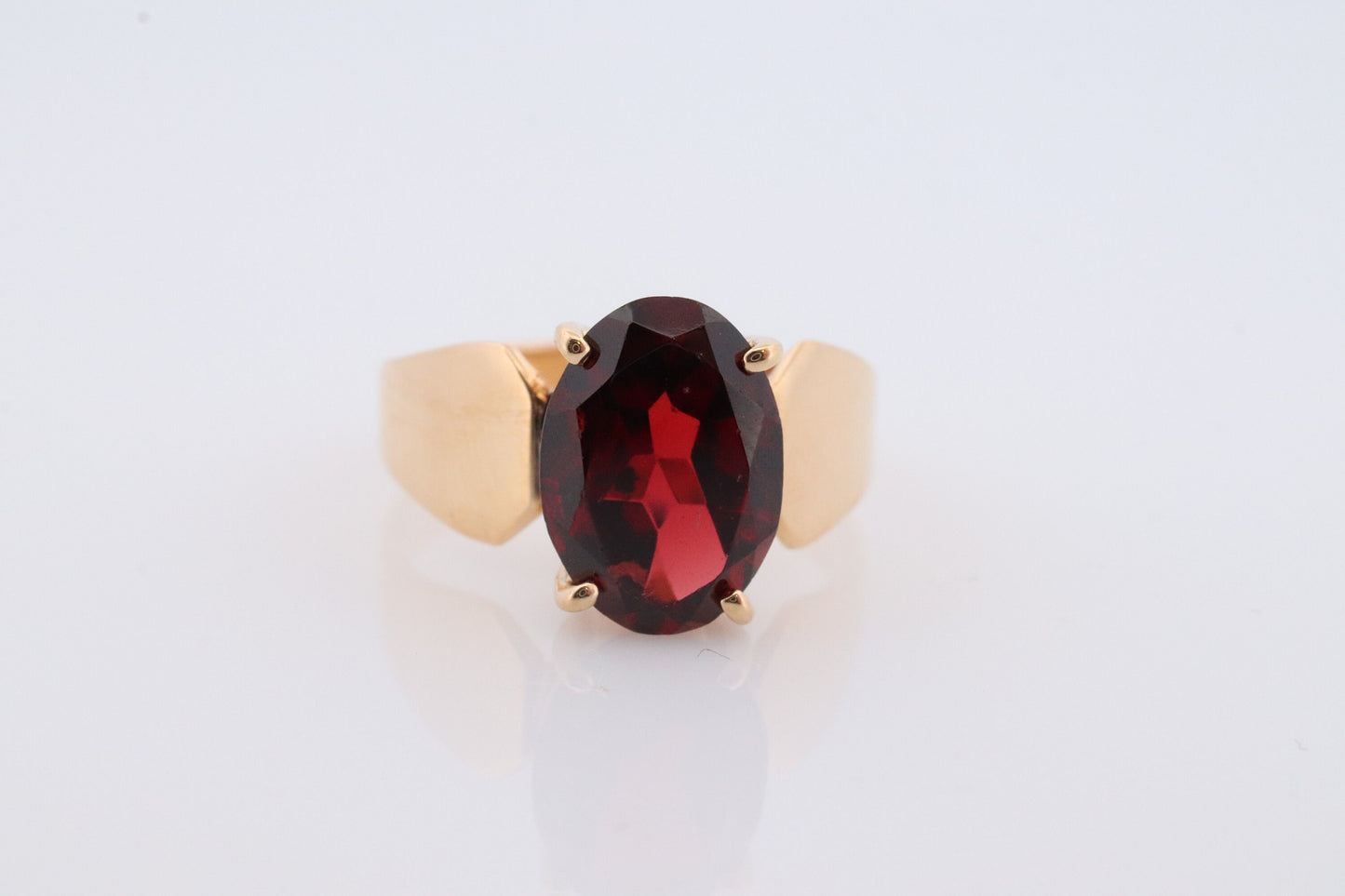 18k Oval Faceted Garnet ring. 18k Oval cut garnet solitaire ring. Large Rhodolite Garnet Solitaire.