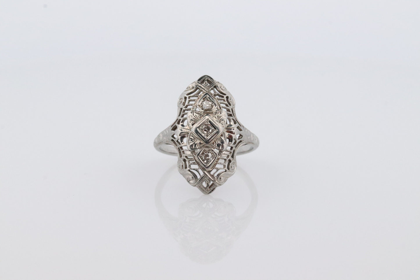 18k Filigree three diamond shield ring. 18k Art Deco trio triple diamond shield ring. Antique Shield Diamond ring.