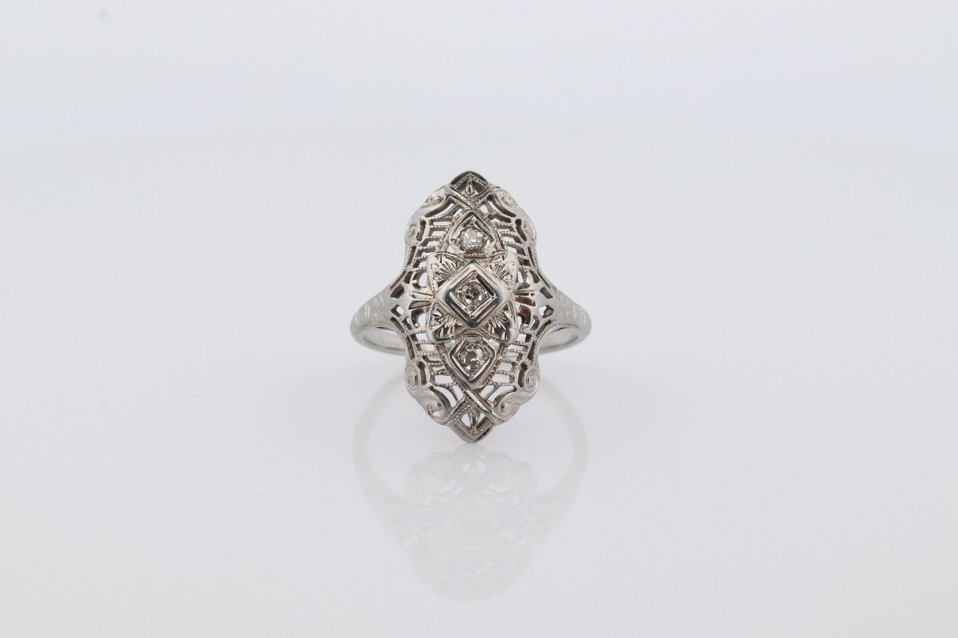 18k Filigree three diamond shield ring. 18k Art Deco trio triple diamond shield ring. Antique Shield Diamond ring.