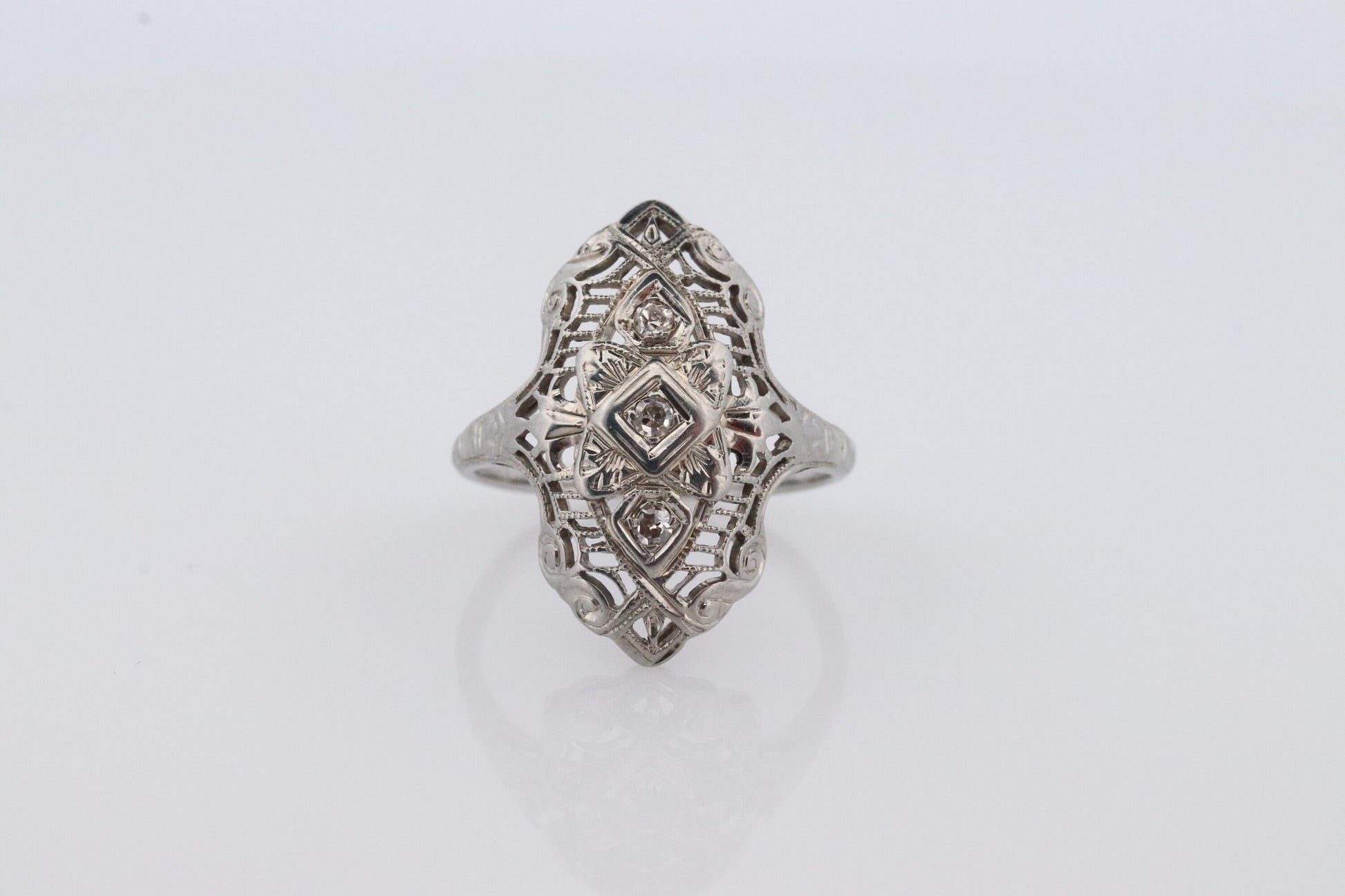 18k Filigree three diamond shield ring. 18k Art Deco trio triple diamond shield ring. Antique Shield Diamond ring.