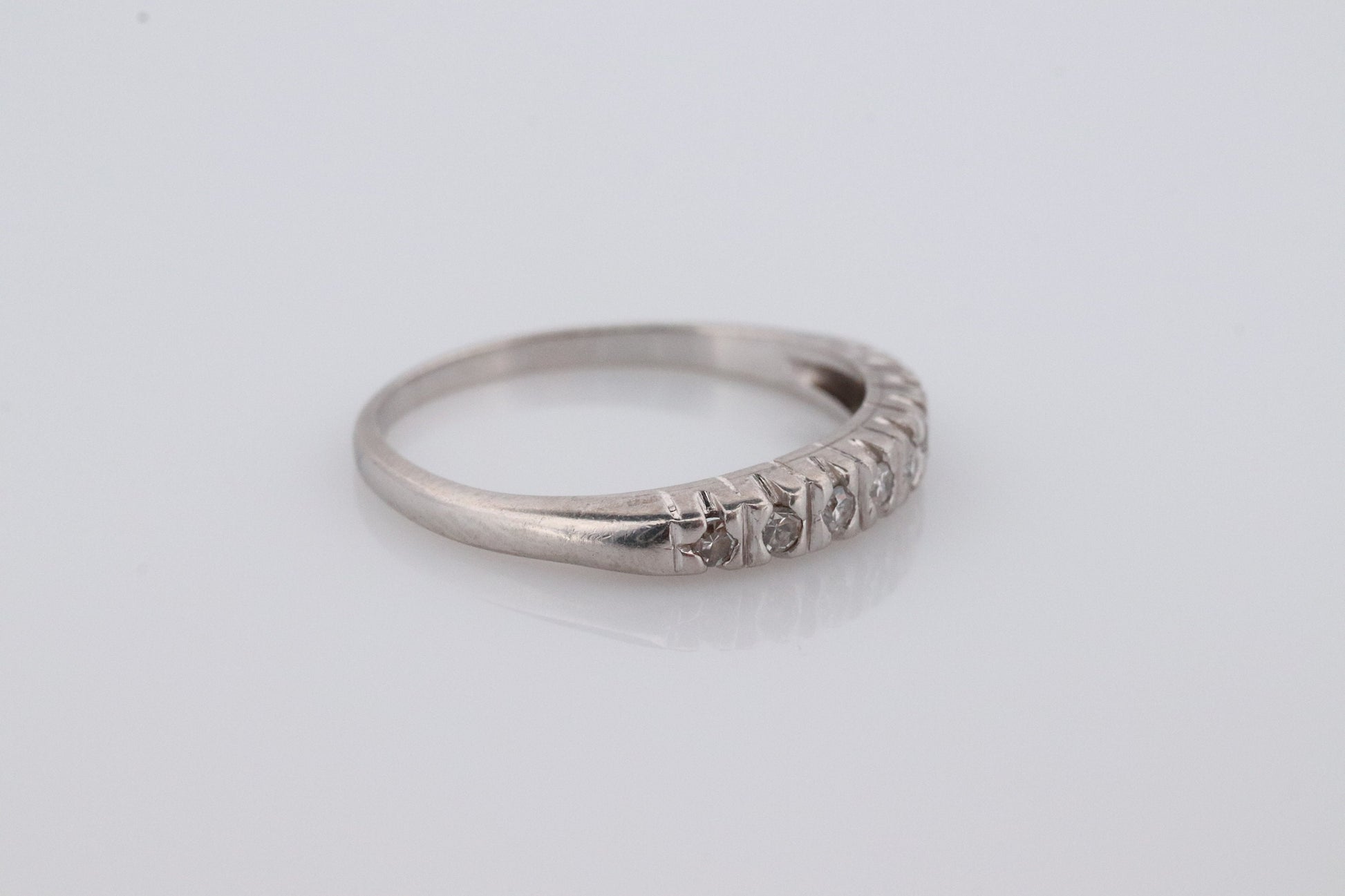 Antique Platinum Diamond eternity channel band. Art Deco diamond eternity infinity band.