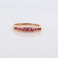 14k Eternity Half Ruby Ring. A 14k gold ring with round Ruby half eternity anniversary band.