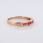 14k Eternity Half Ruby Ring. A 14k gold ring with round Ruby half eternity anniversary band.