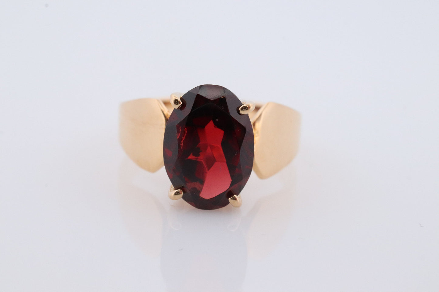 18k Oval Faceted Garnet ring. 18k Oval cut garnet solitaire ring. Large Rhodolite Garnet Solitaire.