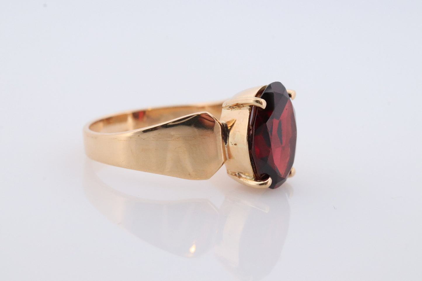 18k Oval Faceted Garnet ring. 18k Oval cut garnet solitaire ring. Large Rhodolite Garnet Solitaire.