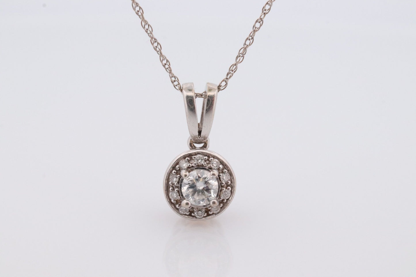 14k Diamond Solitaire Halo Pendant. 14k White gold and 24K Yellow Gold Inlay Canister Pendant. Singapore chain necklace.