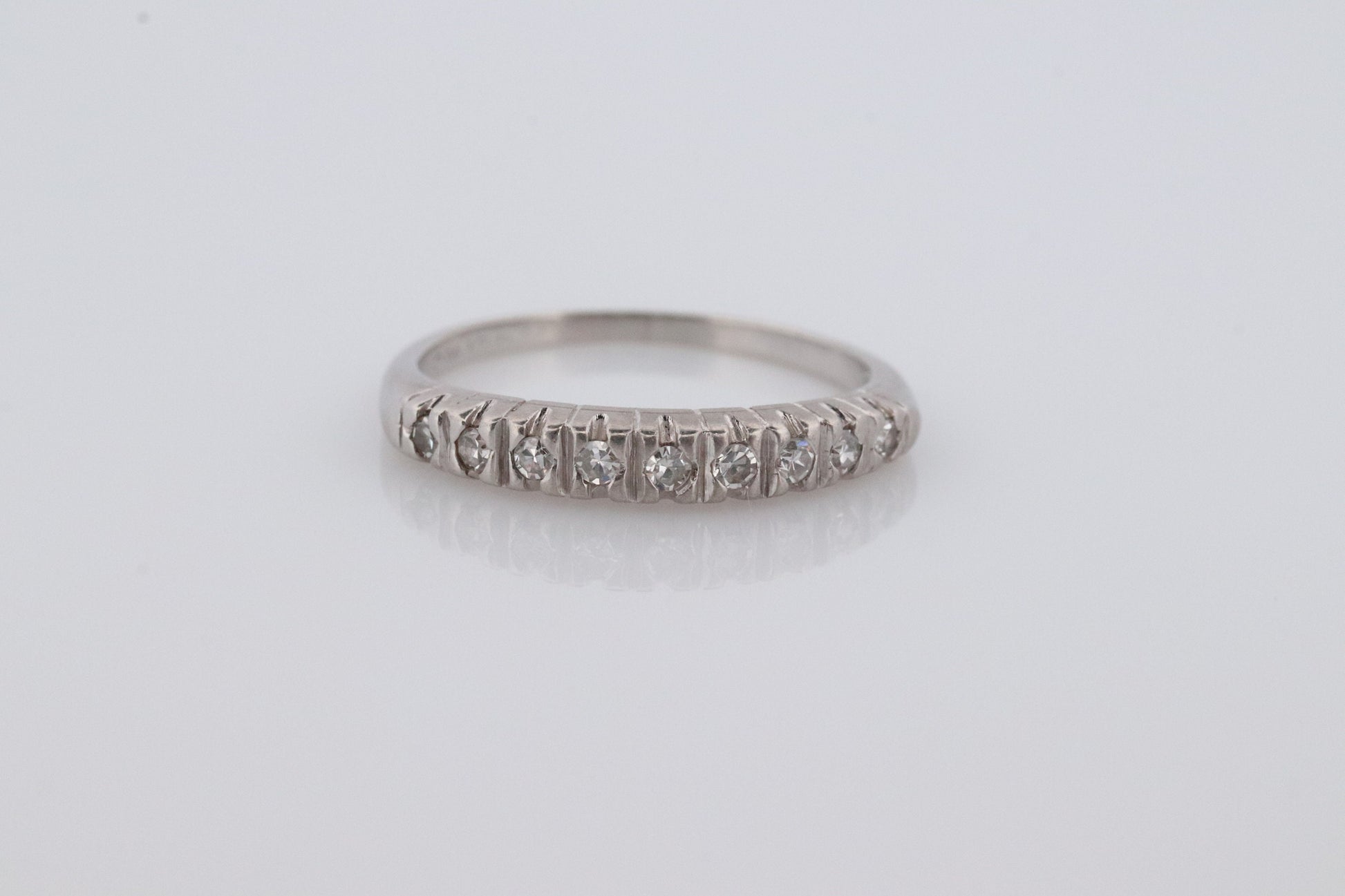 Antique Platinum Diamond eternity channel band. Art Deco diamond eternity infinity band.